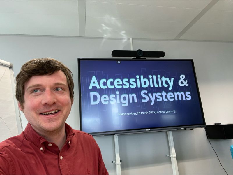 me in front of a slide that says accessibility and design systems